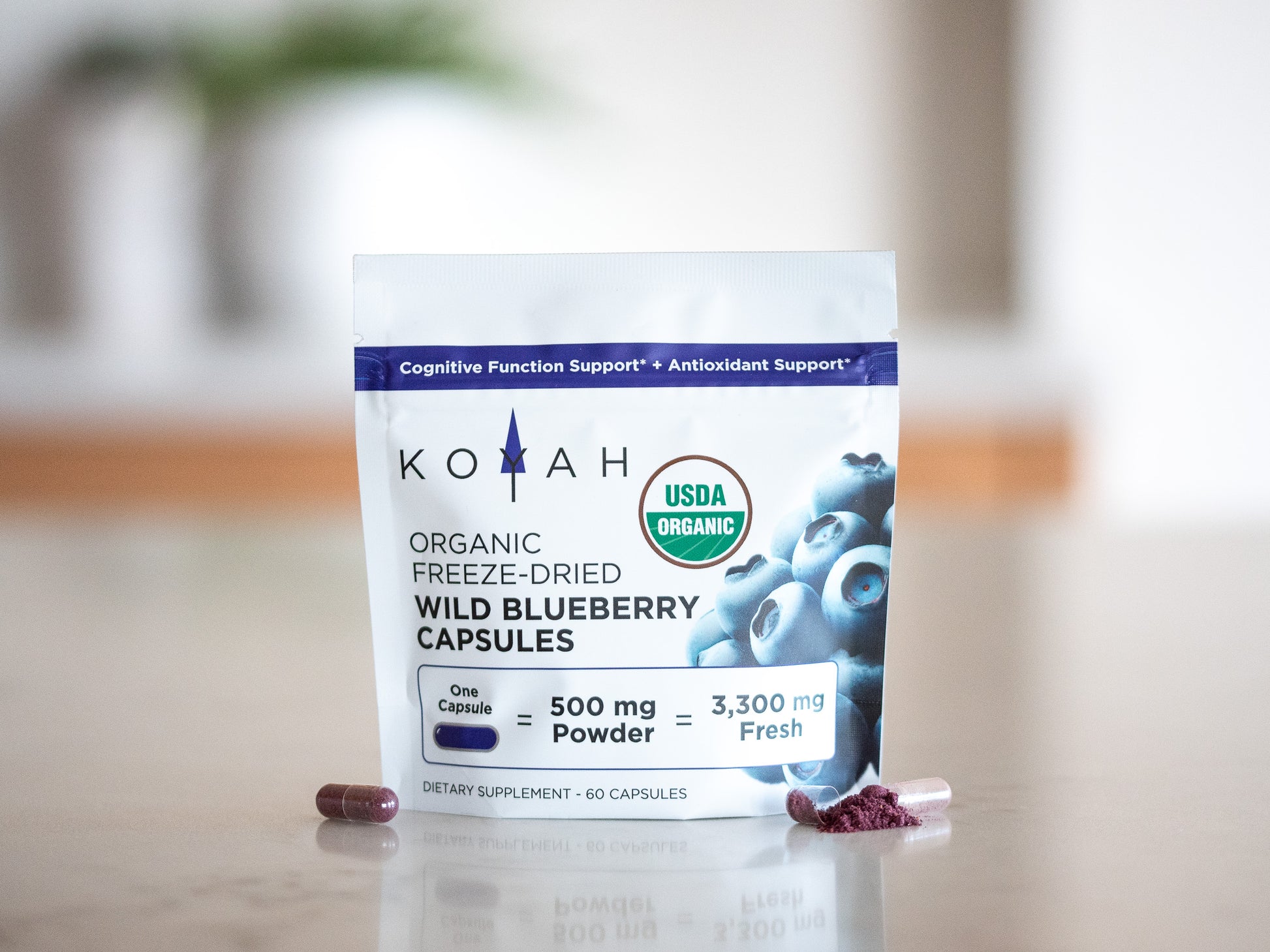 koyah organic wild blueberry capsule and pouch 